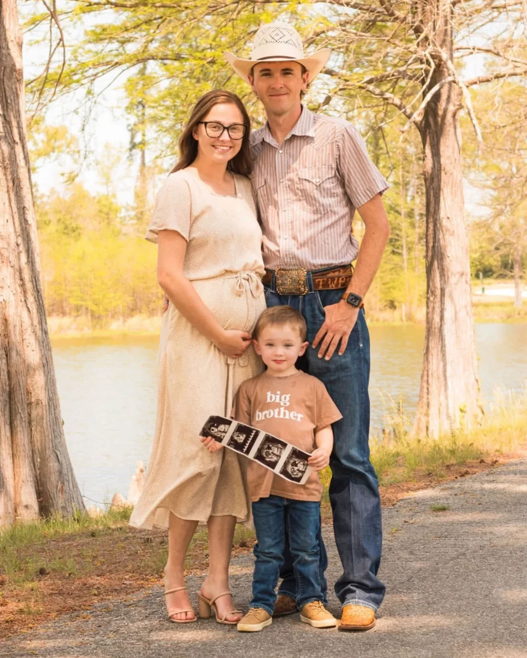 Trevor Pounds with his wife and son